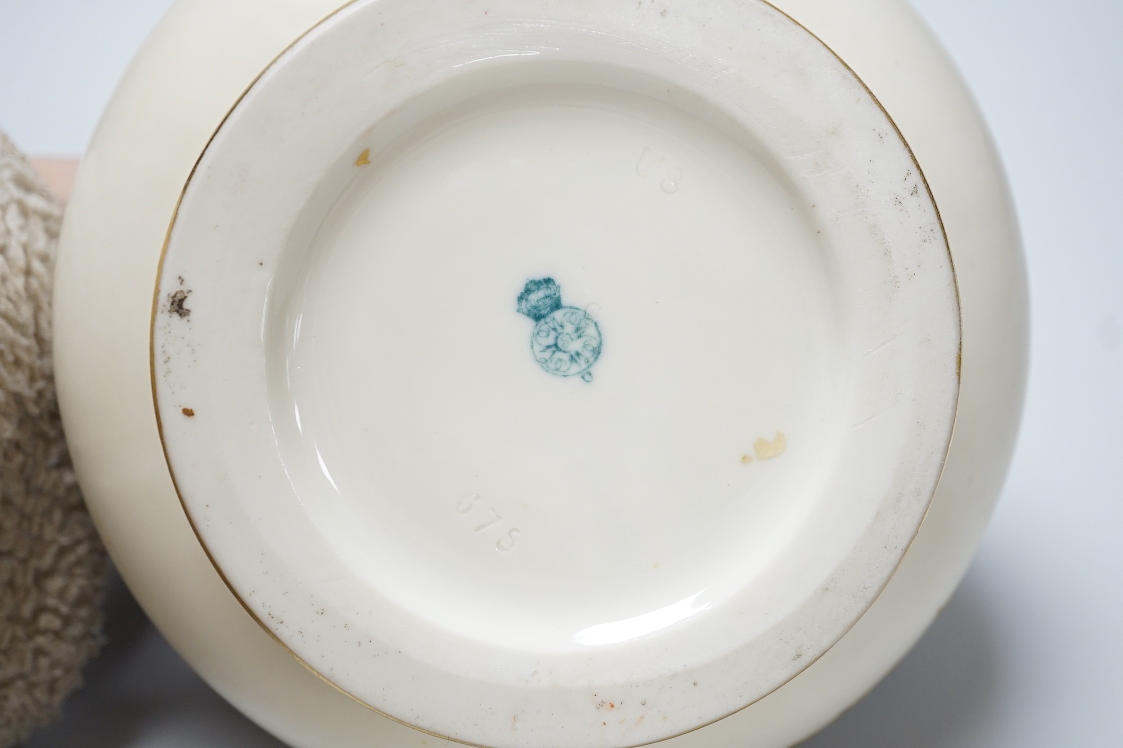 A Royal Worcester gilded vase of bulbous form, 17cm